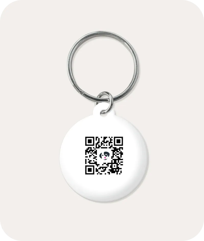 White NFC pet tag with a QR code carrying the WeeDoo logo in the middle